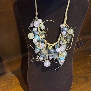 Elegant Beaded Necklace with Blue and Pink Accents